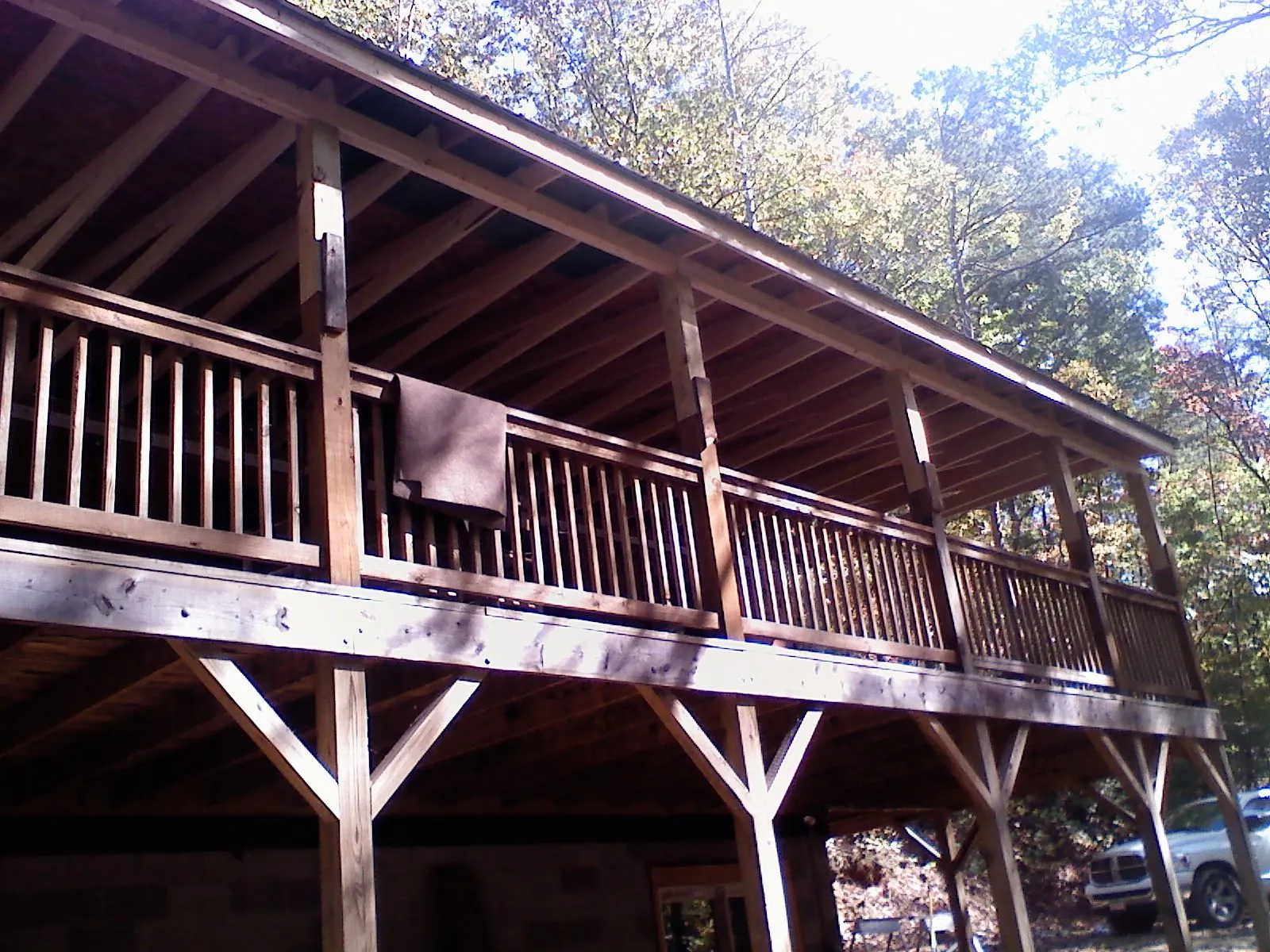 Timber framing under a new elevated porch and deck — Roof Leak Repair in Walkerton by Roofing Brothers